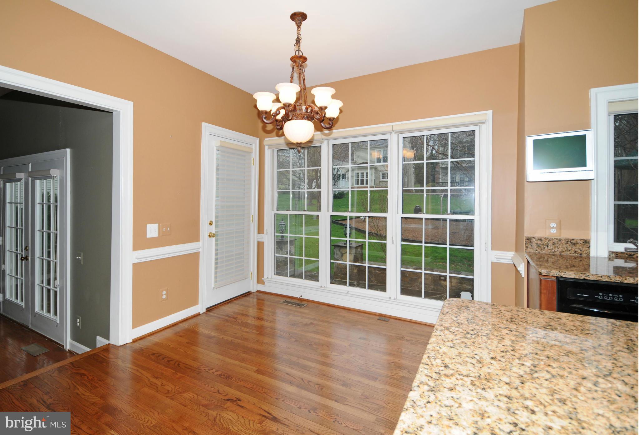 9731 Hidden Valley Road Vienna, VA 22181 - Photo 10 of 30 BREAKFAST AREA OPENS TO FAMILY ROOM