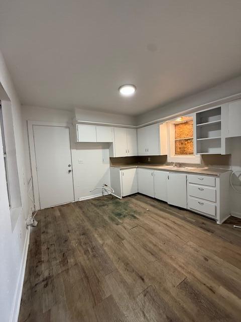 2024 37th Street Lubbock, TX 79412 - Photo 4 of 8 a view of a kitchen with a sink cabinets and a window