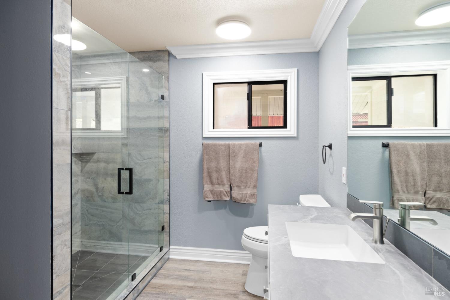 875 White Cottage Road North Angwin, CA 94508 - Photo 46 of 59 a bathroom with a toilet sink and shower