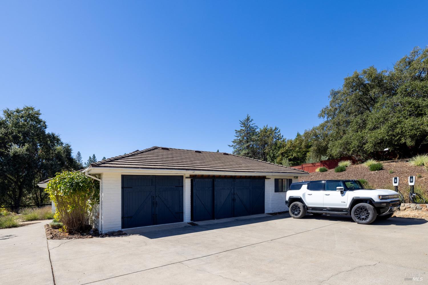875 White Cottage Road North Angwin, CA 94508 - Photo 51 of 59 a view of a car parked in front of a house