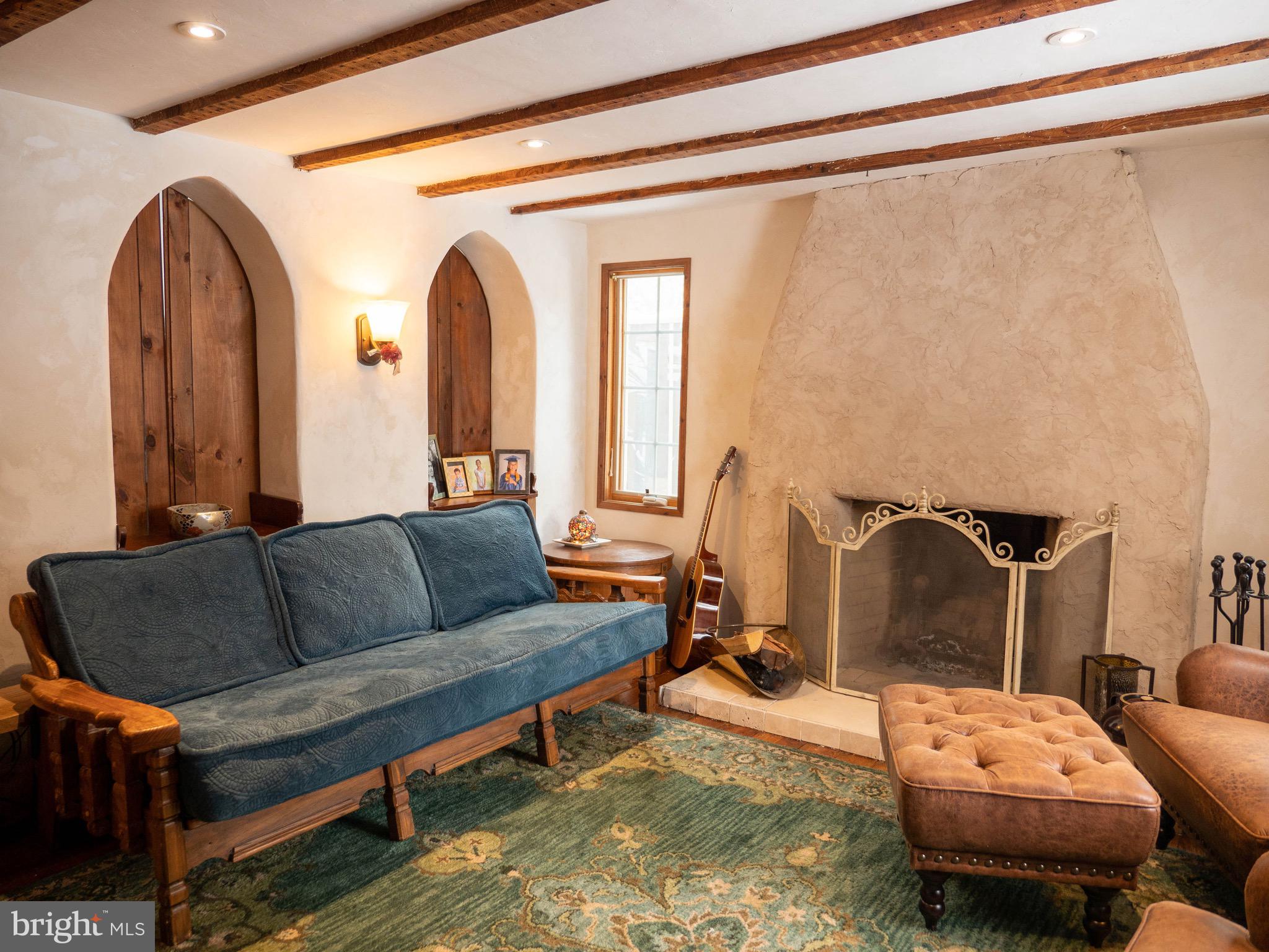 20800 Bivalve Wharf Road Bivalve, MD 21865 - Photo 12 of 31 a living room with furniture and a wooden floor
