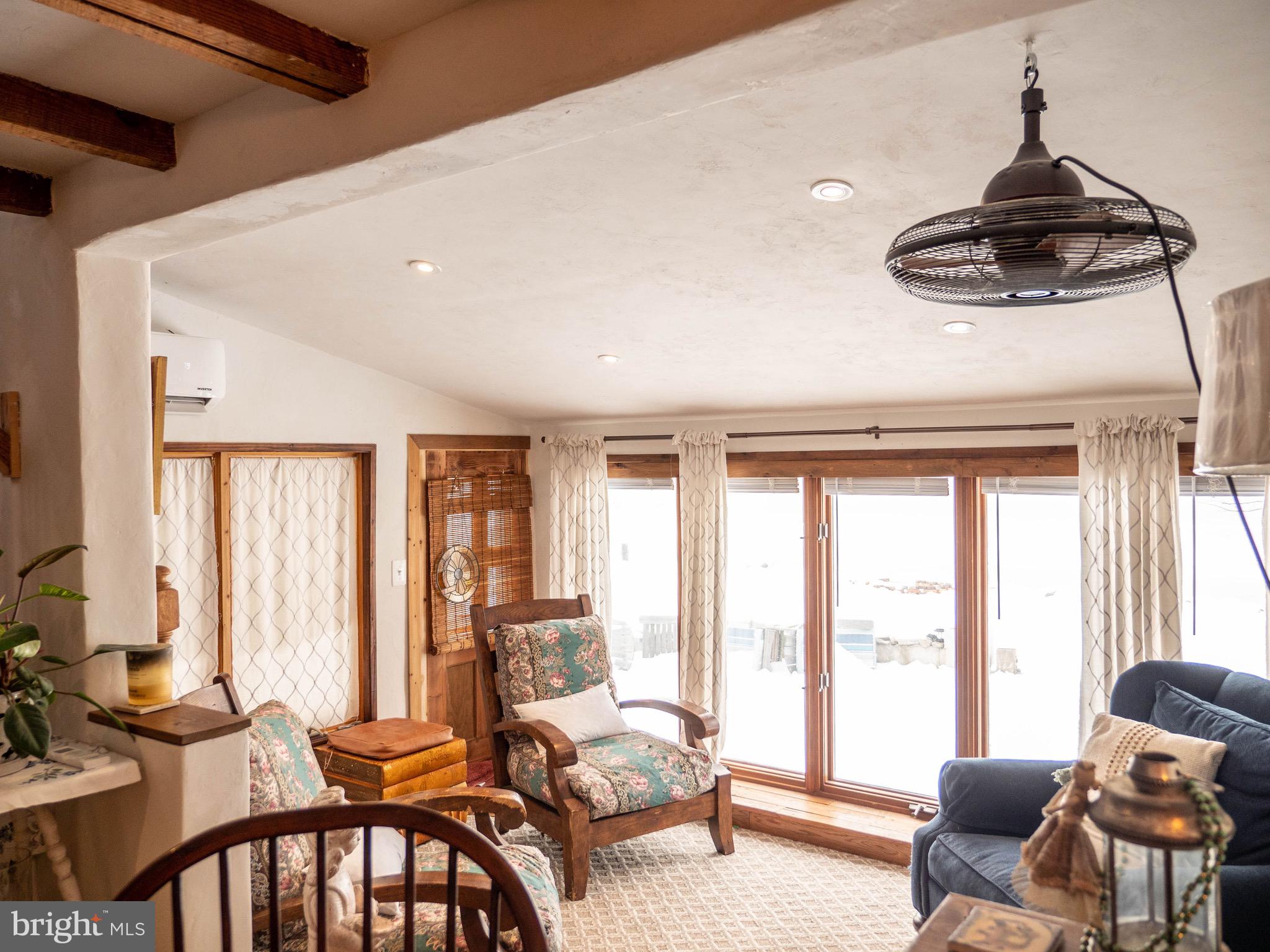 20800 Bivalve Wharf Road Bivalve, MD 21865 - Photo 15 of 31 a bedroom with furniture and a window