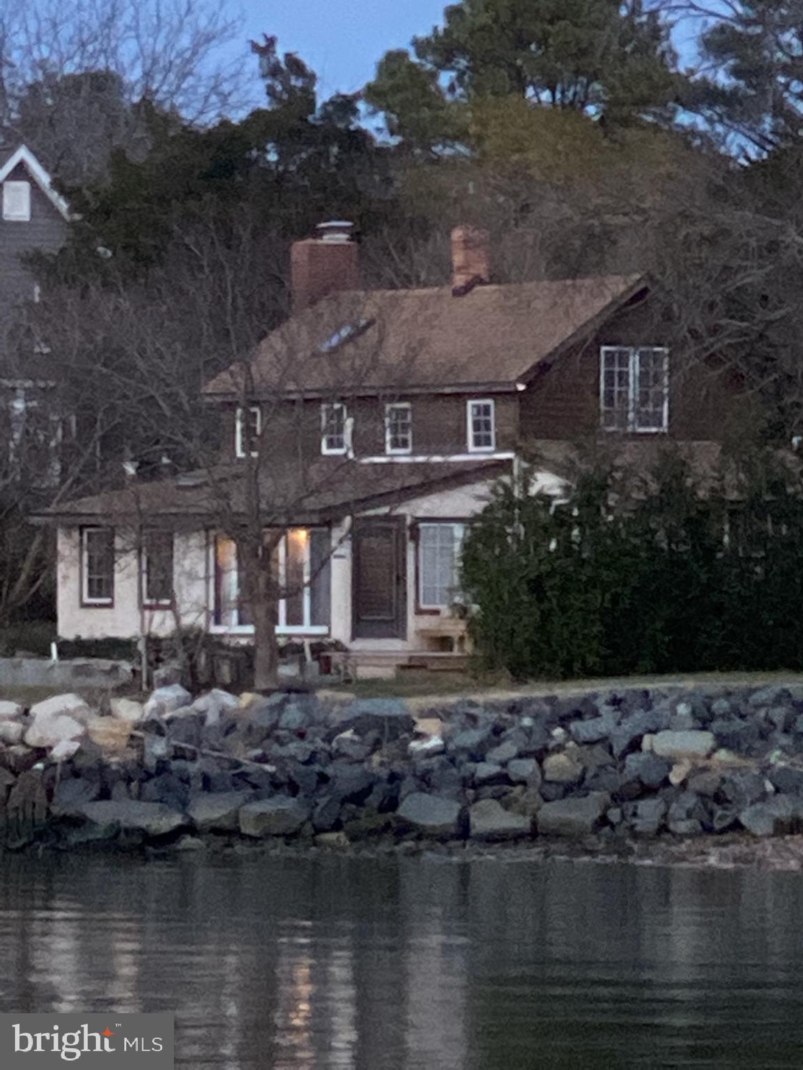 20800 Bivalve Wharf Road Bivalve, MD 21865 - Photo 27 of 31 a front view of a house with a lake view