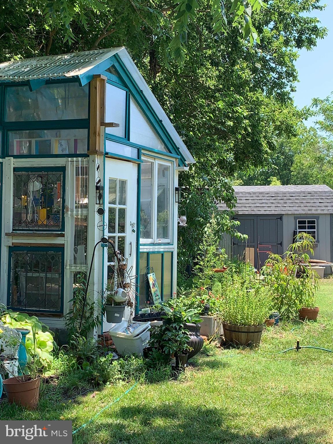 20800 Bivalve Wharf Road Bivalve, MD 21865 - Photo 31 of 31 a view of a house with potted plants and a yard