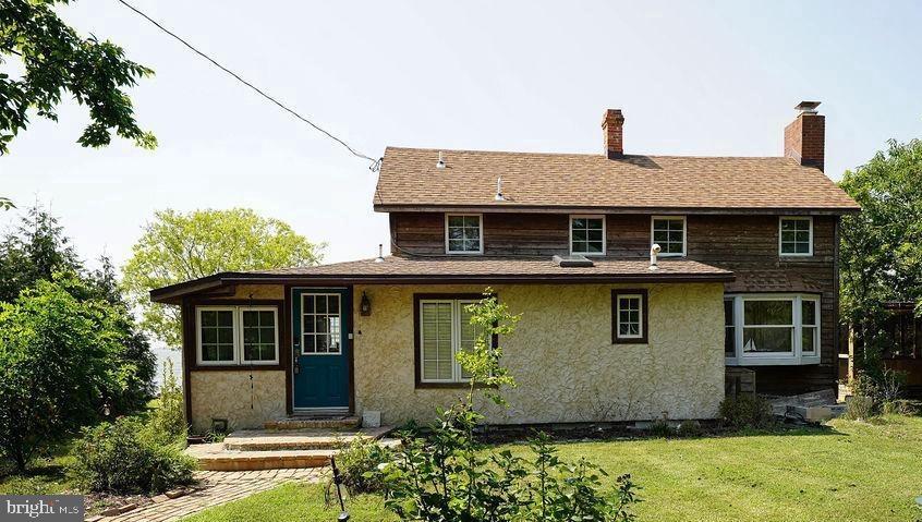 20800 Bivalve Wharf Road Bivalve, MD 21865 - Photo 6 of 31 a front view of a house with garden