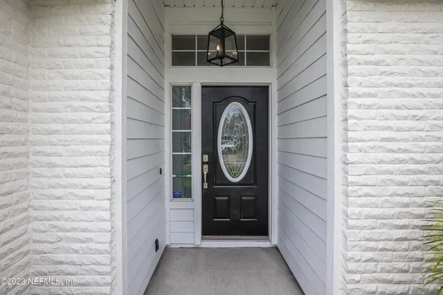 a view of a door of a house with window