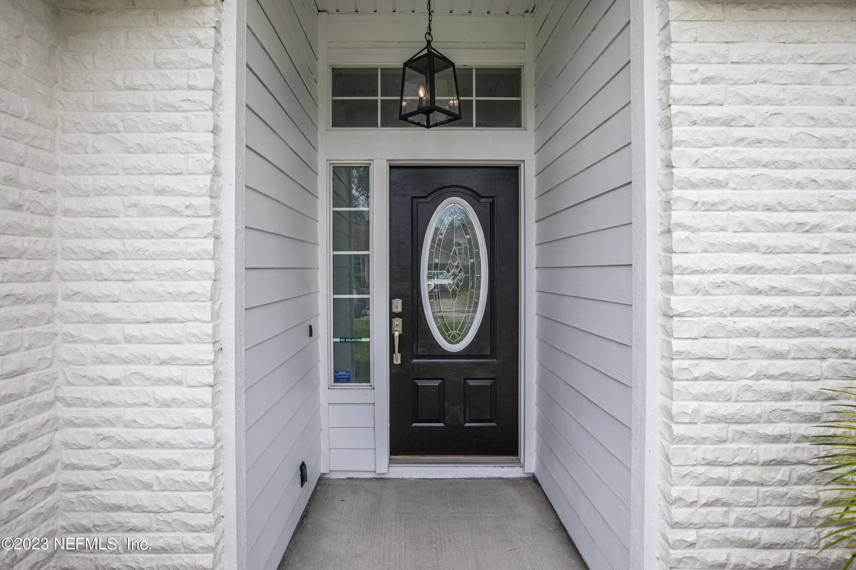 13607 Capistrano Drive South Jacksonville, FL 32224 - Photo 2 of 24 a view of a door of a house with window