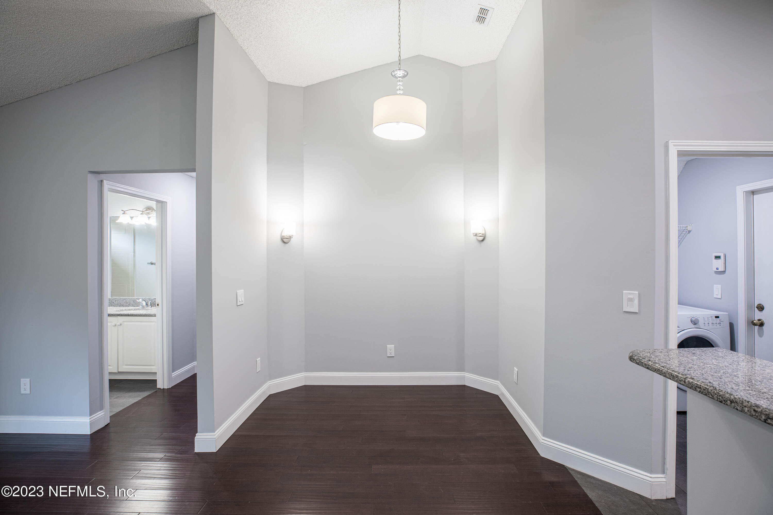 13607 Capistrano Drive South Jacksonville, FL 32224 - Photo 8 of 24 a view of a room with wooden floor and staircase