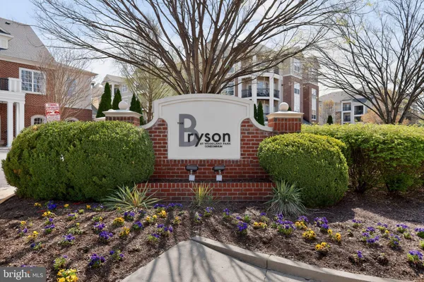 a house view with a sitting space and garden