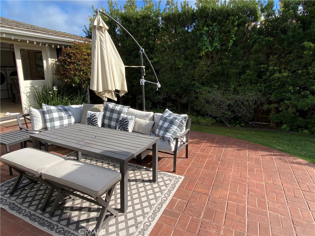 821 Emerald Bay Laguna Beach, CA 92651 - Photo 11 of 15 a view of a patio with couple of chairs