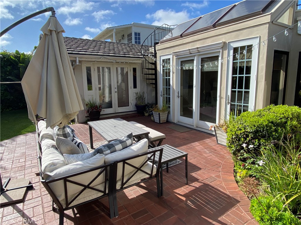 821 Emerald Bay Laguna Beach, CA 92651 - Photo 12 of 15 a view of a house with backyard and sitting area