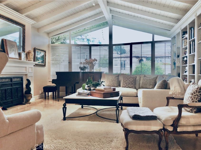 821 Emerald Bay Laguna Beach, CA 92651 - Photo 4 of 15 a living room with furniture and a large window