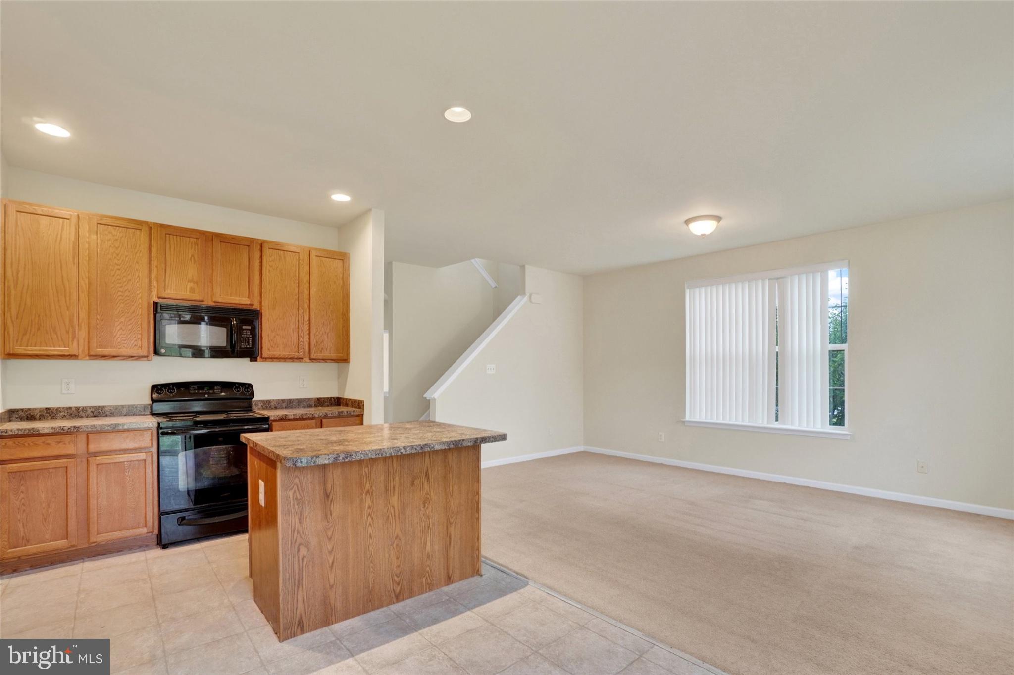 2450 Walnut Bottom Road, Unit 85 York, PA 17408 - Photo 7 of 27 Modern kitchen with open layout charm.