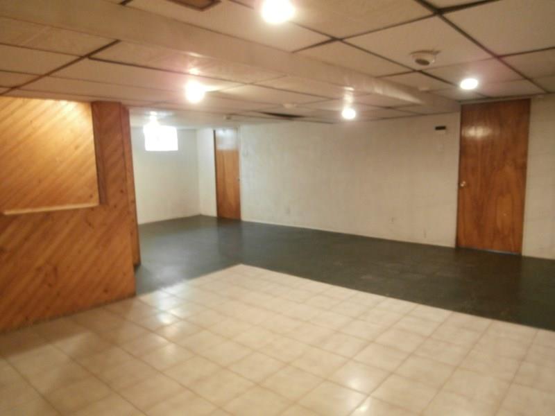 1461 Prospect Road Baldwin, PA 15227 - Photo 21 of 25 GAME ROOM EXTRA STORAGE ROOM OVER SIZED GARAGE