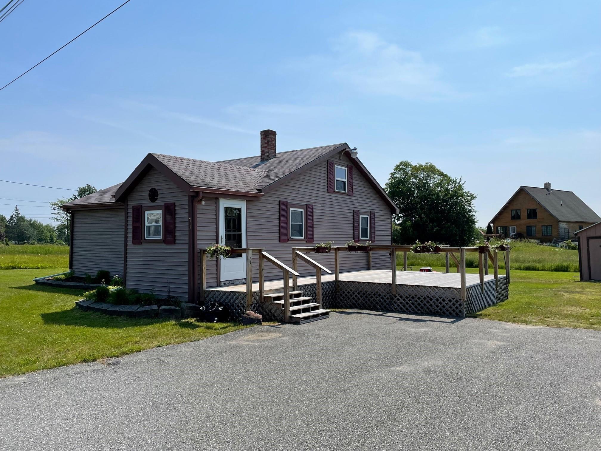 73 Rim Road Milbridge, ME 04658 - Photo 1 of 10 exterior paved drive lg deck