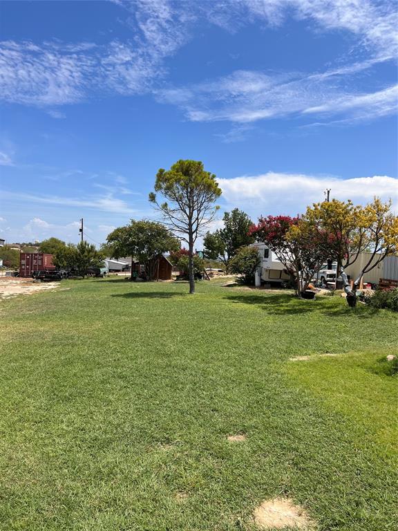 200 Enchanted Lakes Circle Azle, TX 76020 - Photo 1 of 12 a view of yard with ocean view