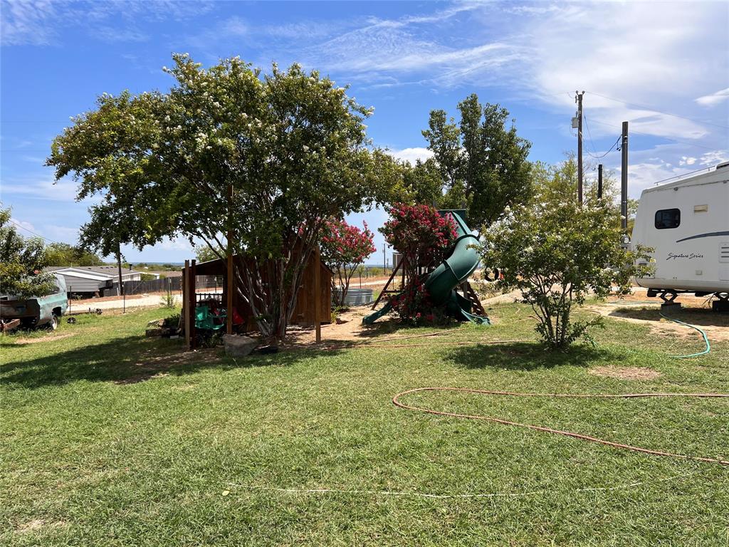 200 Enchanted Lakes Circle Azle, TX 76020 - Photo 10 of 12 a view of a park with large trees