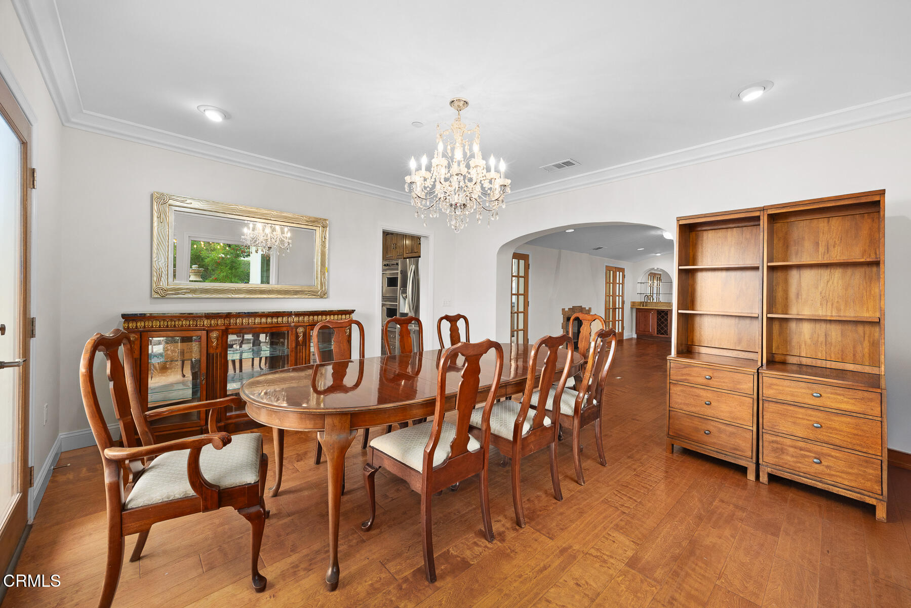 450 Allendale Road Pasadena, CA 91106 - Photo 16 of 57 a view of a dining room with furniture and a chandelier