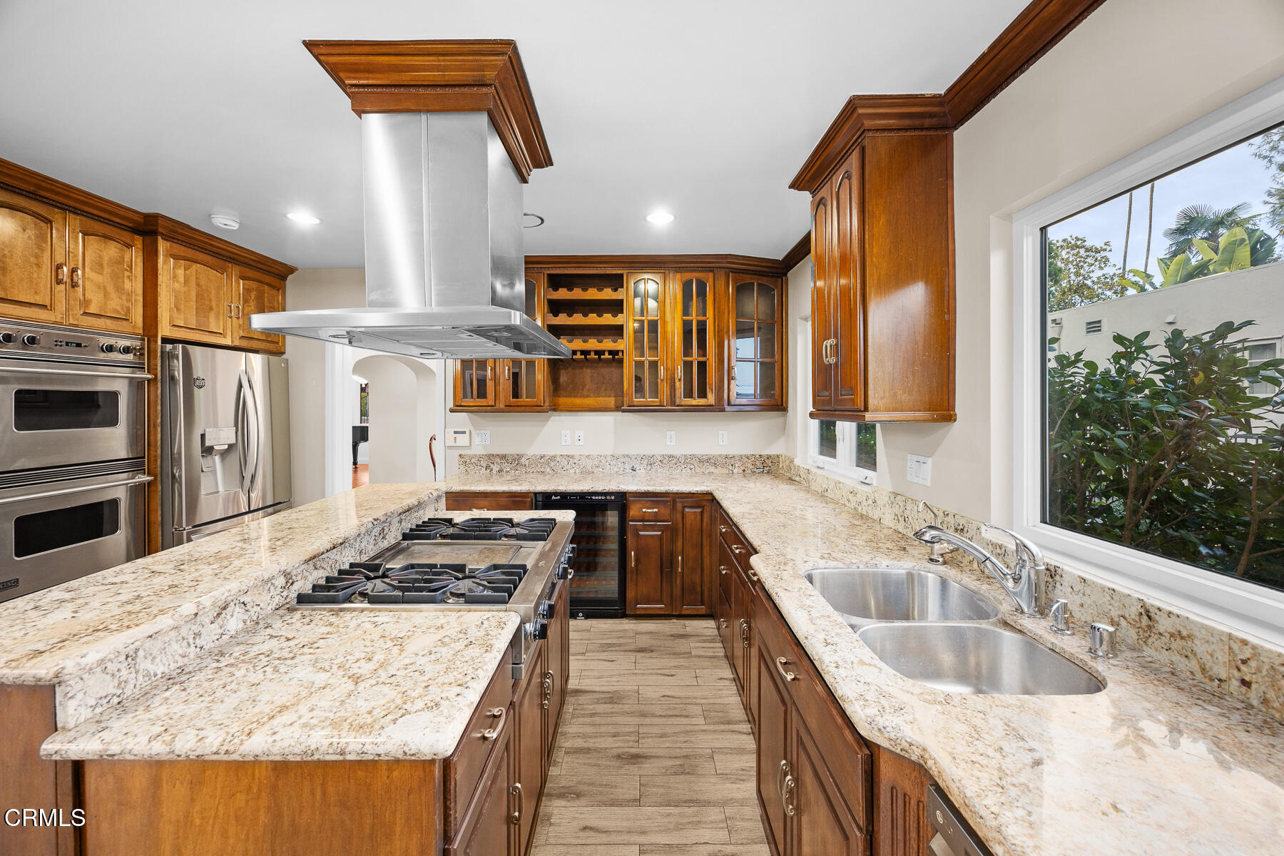 450 Allendale Road Pasadena, CA 91106 - Photo 21 of 57 a kitchen with granite countertop a sink and stove