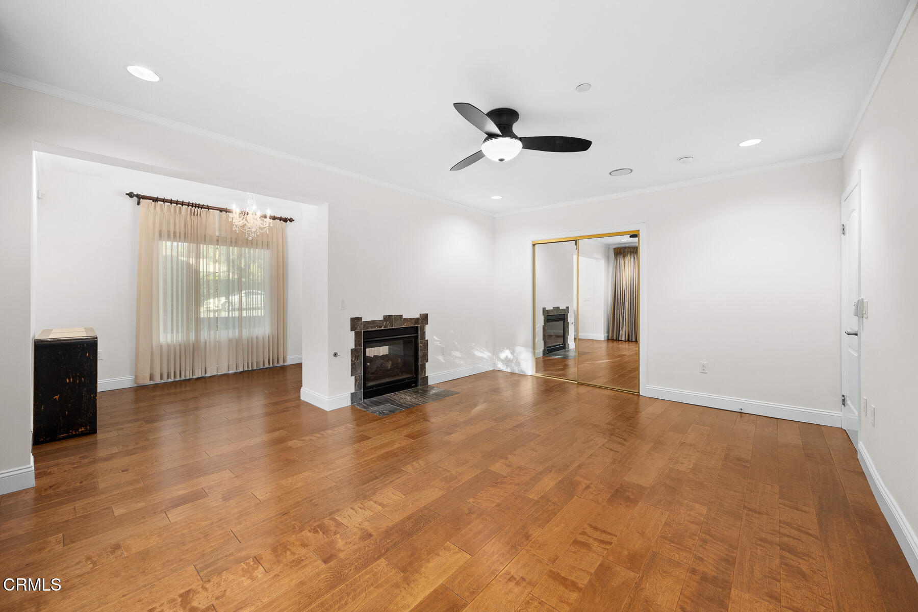 450 Allendale Road Pasadena, CA 91106 - Photo 26 of 57 a view of an empty room with window and cabinet area
