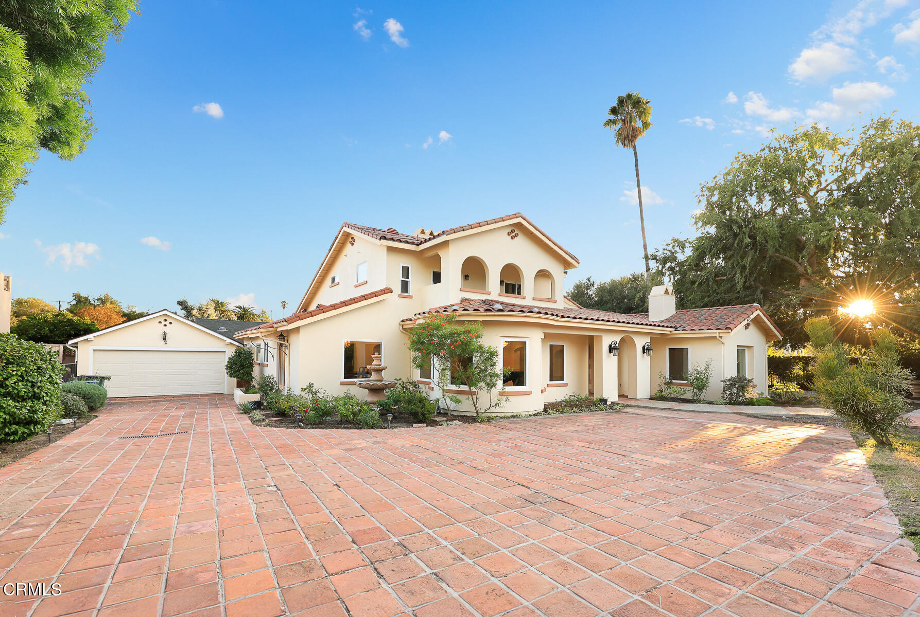 450 Allendale Road Pasadena, CA 91106 - Photo 6 of 57 a front view of a house with a yard and potted plants