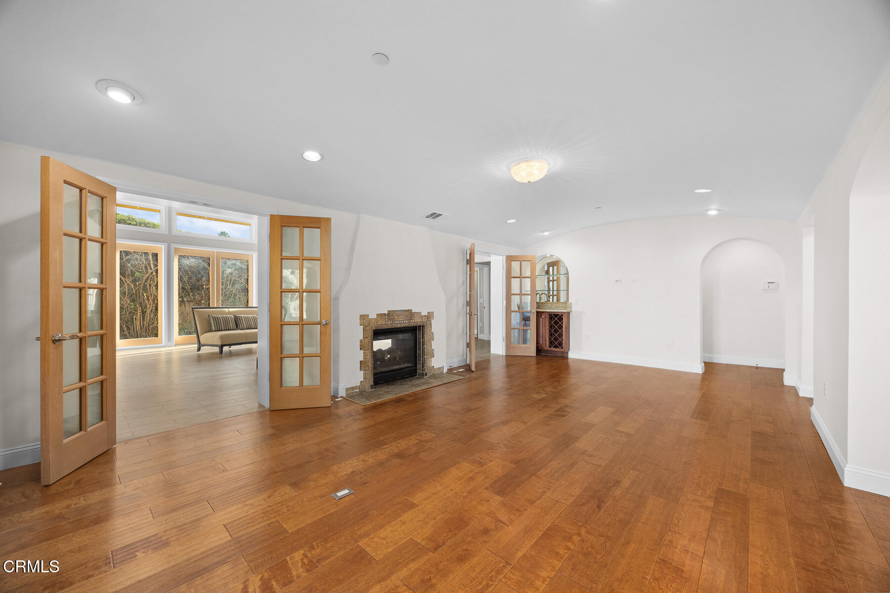 450 Allendale Road Pasadena, CA 91106 - Photo 10 of 57 a view of an empty room with wooden floor and a window