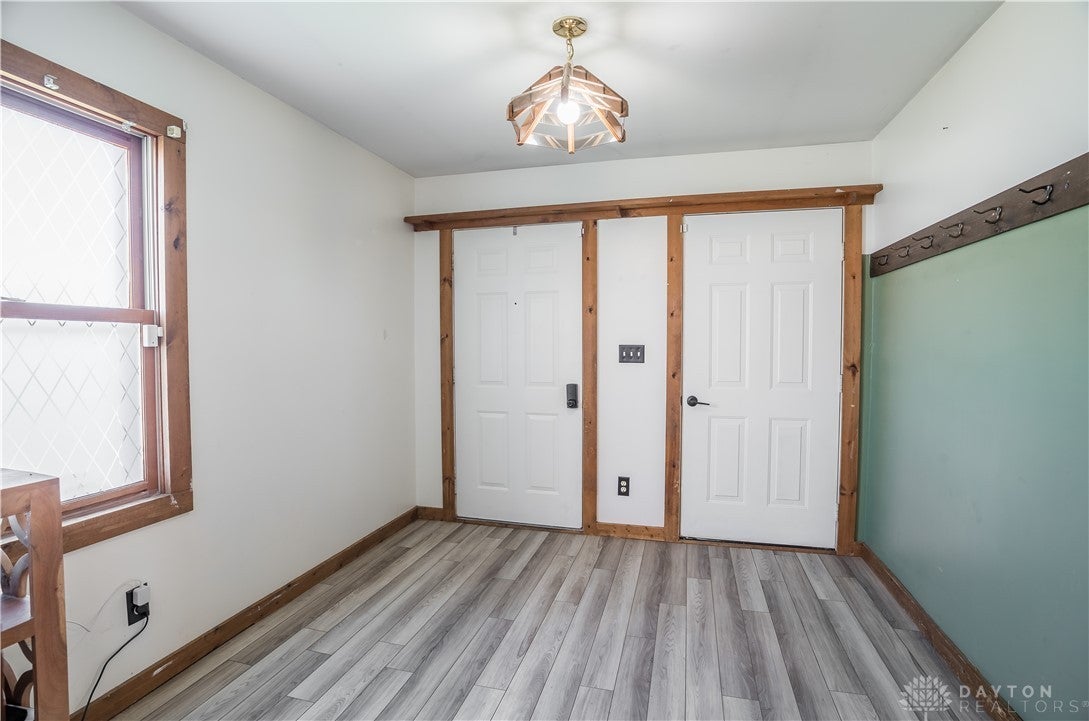 220 Racer Street Troy, OH 45373 - Photo 6 of 33 This entry space features durable flooring and functional entryways (including a service door to the attached garage, ready for your personal touch.