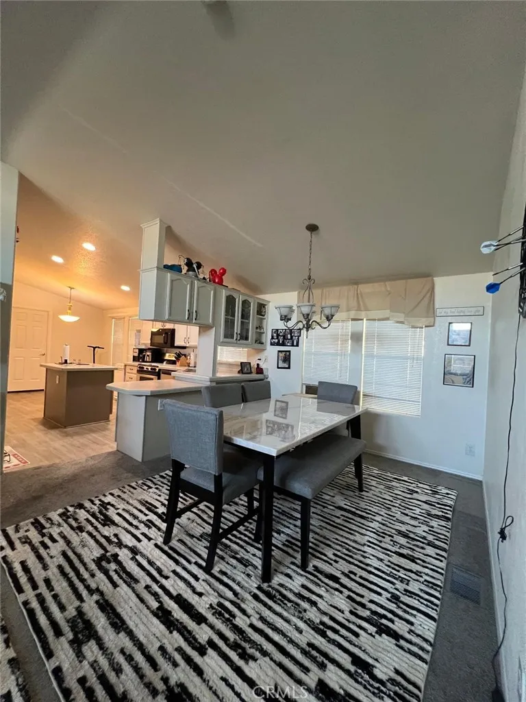 10550 Western, Unit 43 Stanton, CA 90680 - Photo 16 of 27 a dining room with furniture