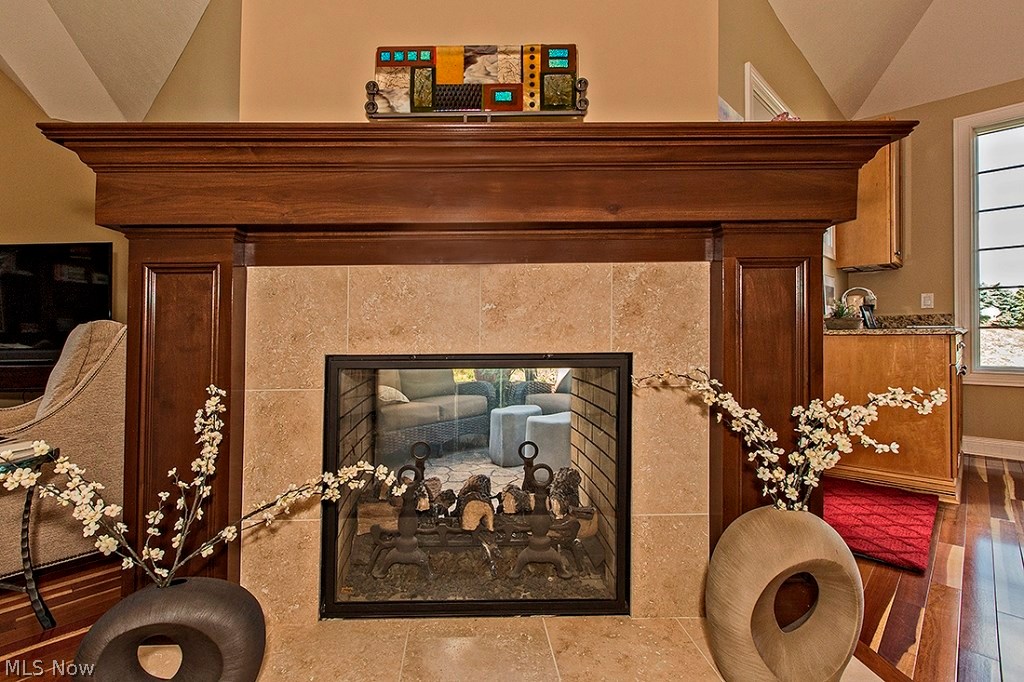 3375 Legends Way Cleveland, OH 44124 - Photo 8 of 33 Spectacular Great Room with Soaring Ceilings, Natural Cherry Hardwood Floors, Custom Built-ins and Two Sided Fireplace