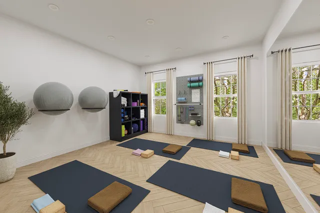 a bed room with a bed and window