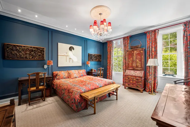 a kitchen with a large window and a sink