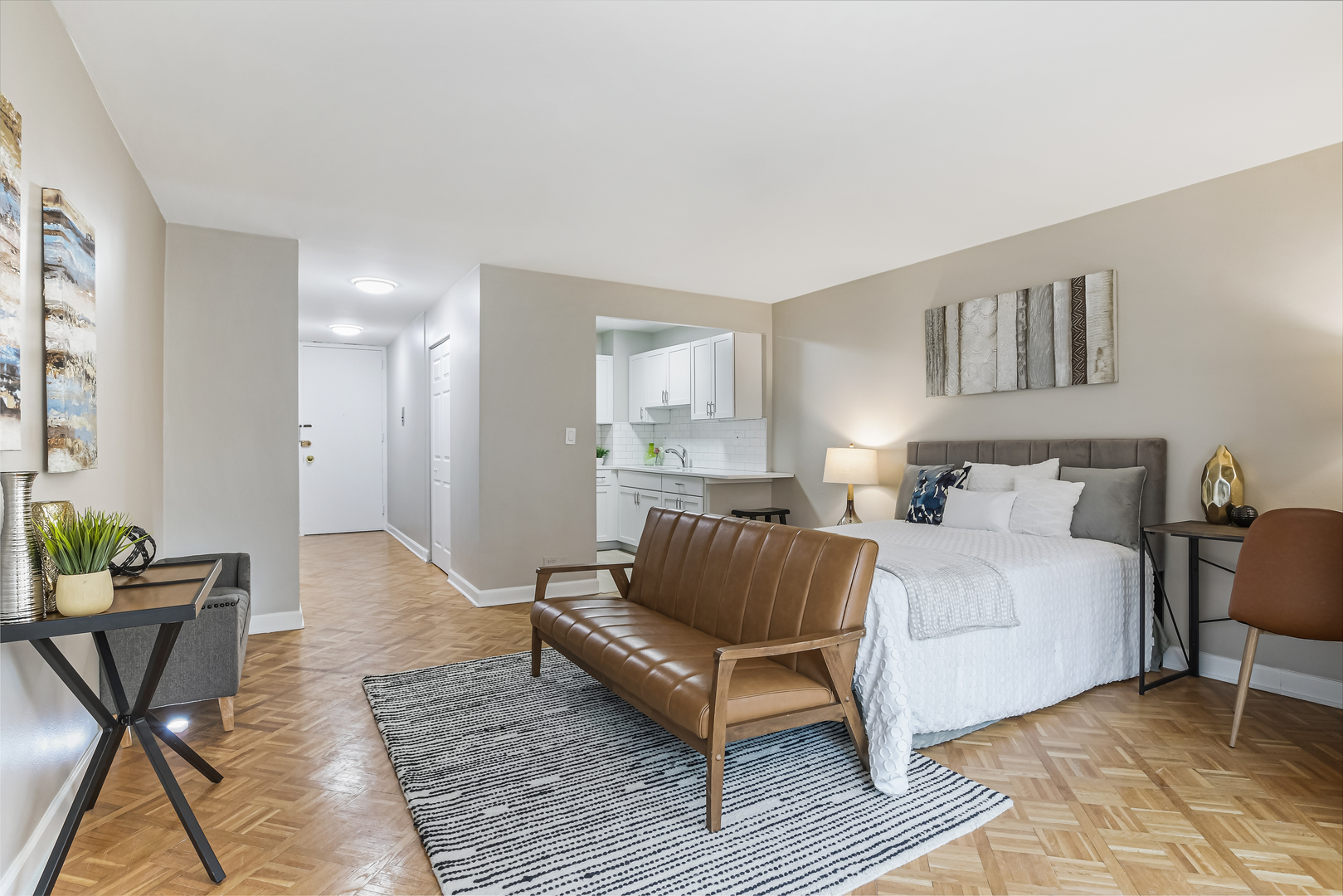 21 West Goethe Street, Unit 14D Chicago, IL 60610 - Photo 11 of 28 a bedroom with furniture and a rug