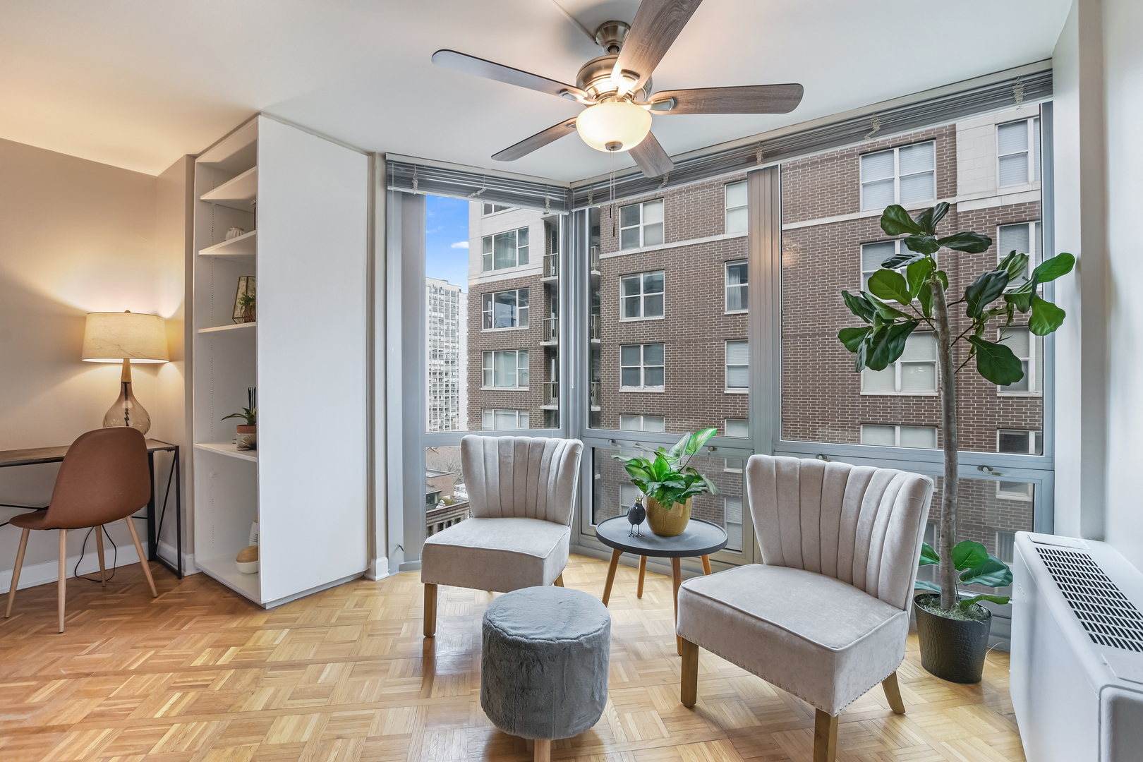 21 West Goethe Street, Unit 14D Chicago, IL 60610 - Photo 9 of 28 a view of a livingroom with furniture and a potted plant