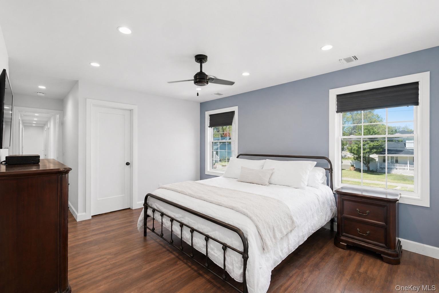 18 Pond Road Holbrook, NY 11741 - Photo 19 of 41 Primary Bedroom featuring wood-finish flooring, recessed lighting, and a ceiling fan