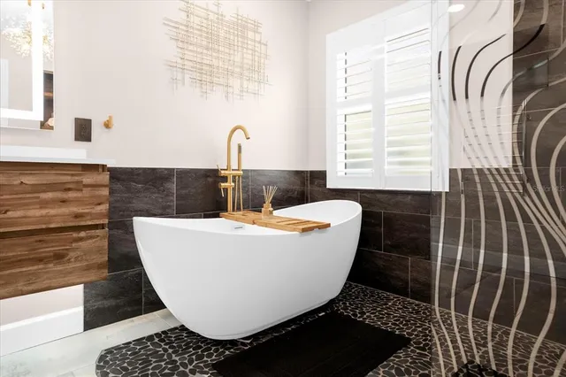 a view of a bathtub in a bathroom