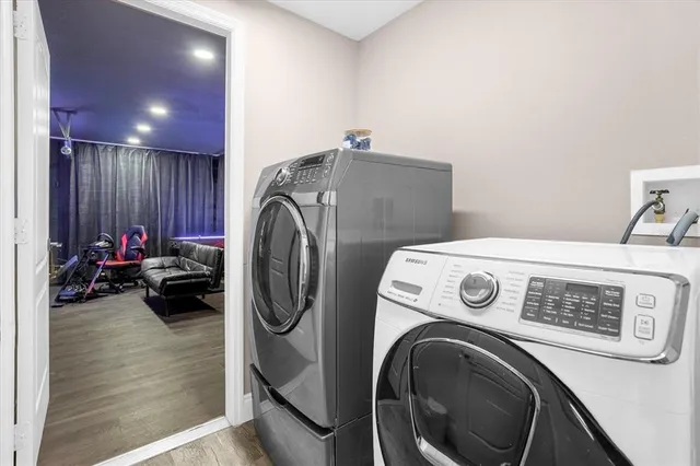 a utility room with dryer and washer