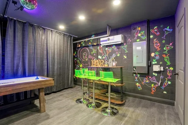 a room with chairs and window