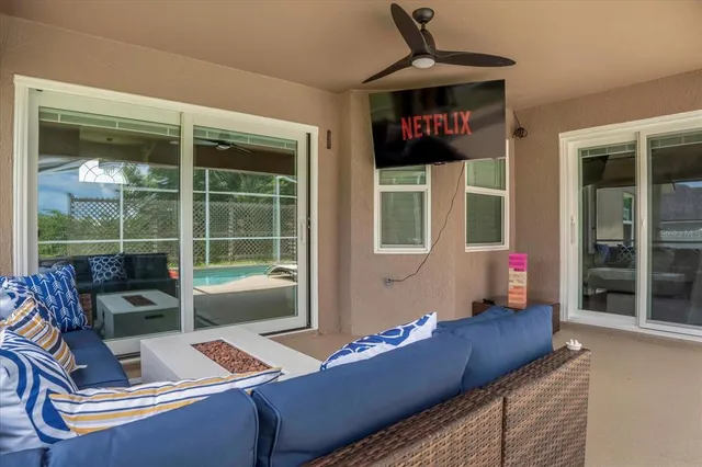 a living room with furniture and a window