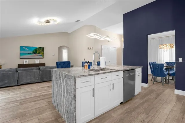 a large bathroom with a large mirror and sink