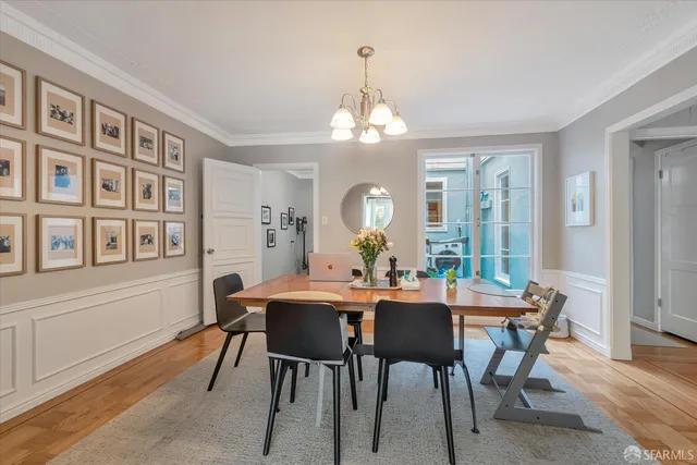 a room with furniture and a large window