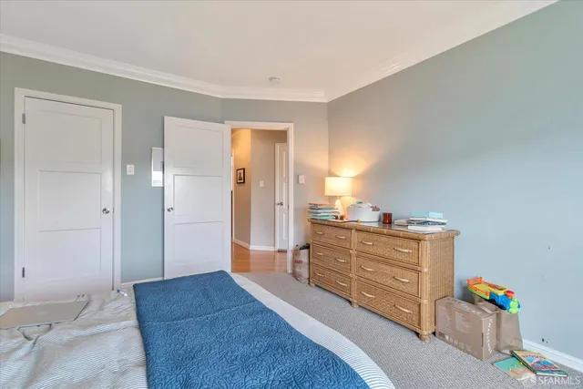 a kitchen with stainless steel appliances granite countertop a refrigerator stove top oven a sink and dishwasher