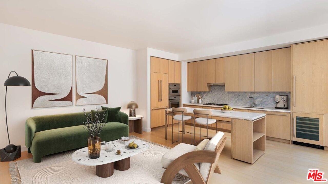 151 South Olive Street, Unit PH4501 Los Angeles, CA 90012 - Photo 1 of 14 a living room with furniture and a wooden floor