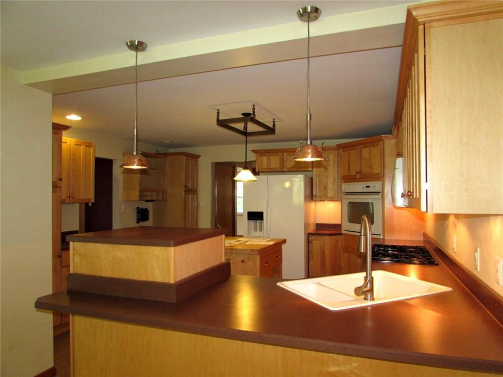 311 Glasgow Road Pittsburgh, PA 15221 - Photo 8 of 25 looking into Kitchen from Family Room