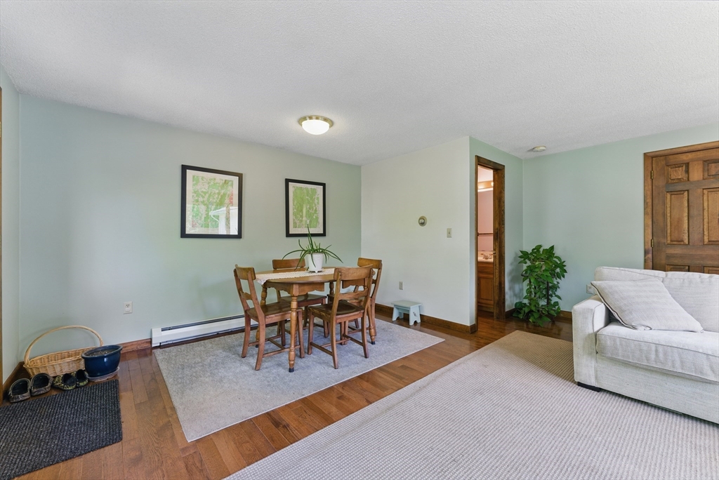 19 Straits Road Hatfield, MA 01038 - Photo 16 of 42 a view of a livingroom with furniture and wooden floor