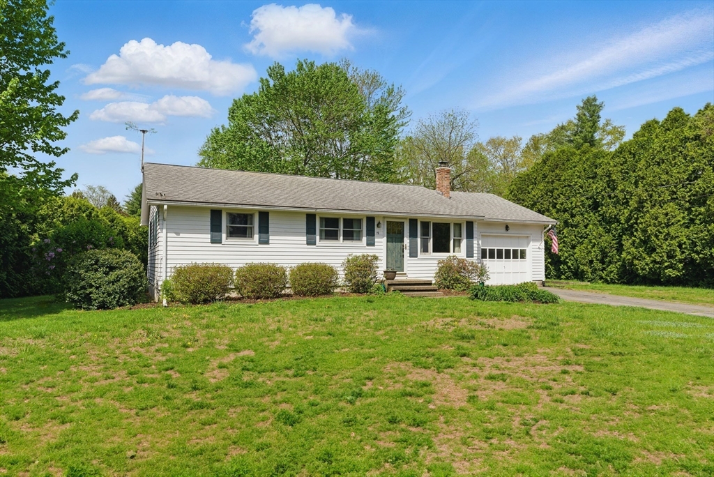 19 Straits Road Hatfield, MA 01038 - Photo 2 of 42 a front view of a house with a garden