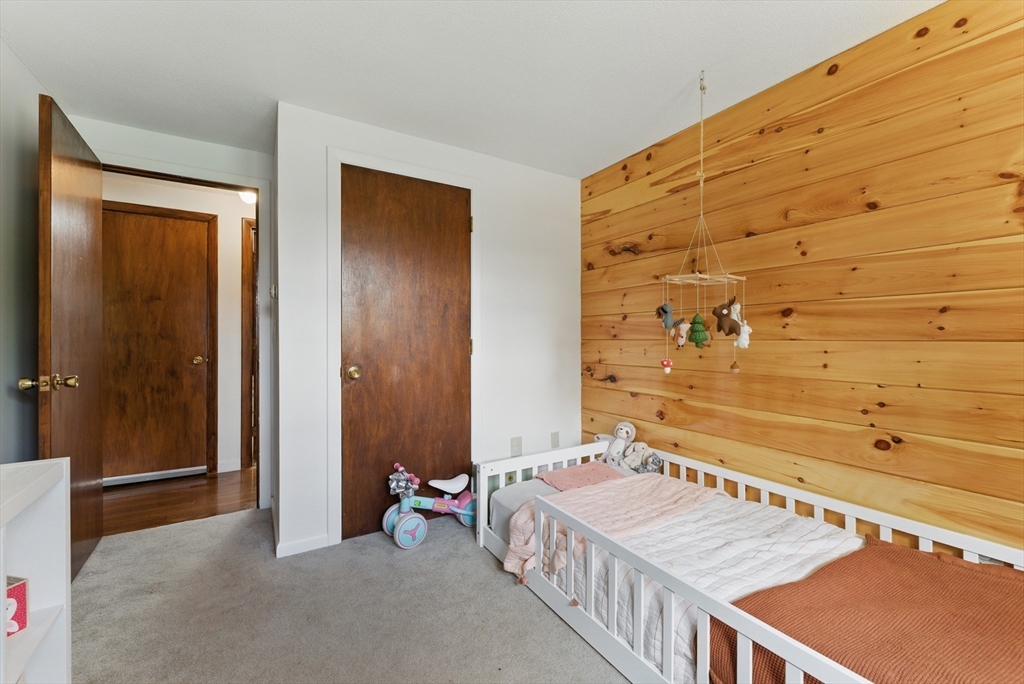 19 Straits Road Hatfield, MA 01038 - Photo 21 of 42 a bedroom with a bed and a table