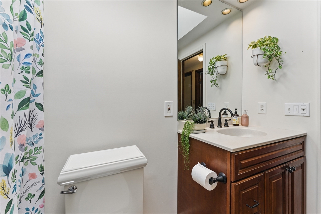 19 Straits Road Hatfield, MA 01038 - Photo 23 of 42 a bathroom with a sink a toilet and a mirror