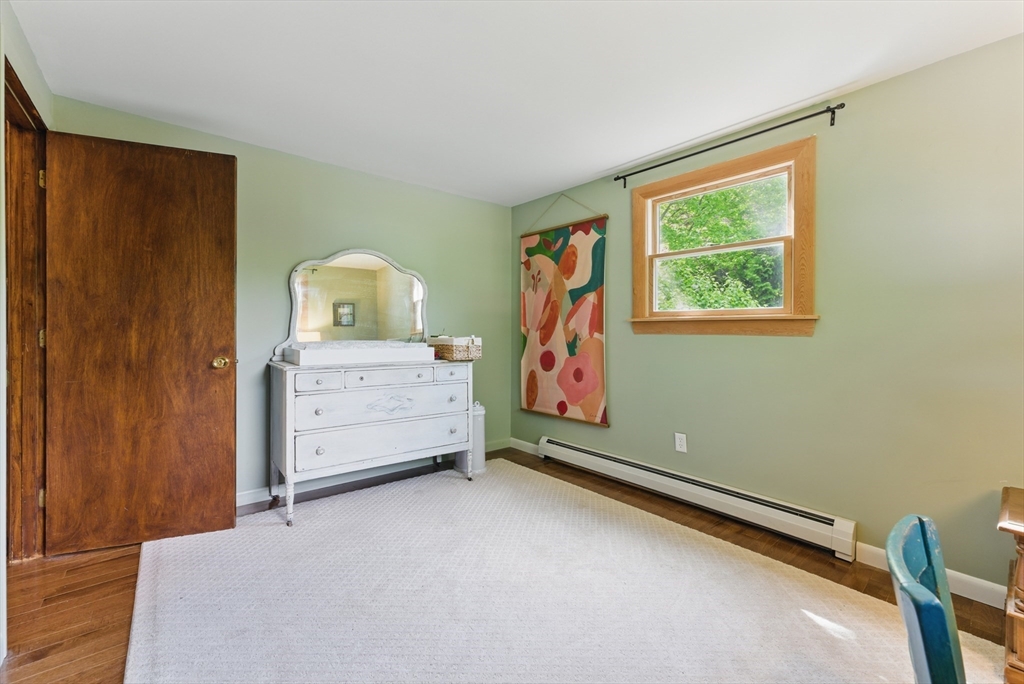 19 Straits Road Hatfield, MA 01038 - Photo 25 of 42 a room with a bed and a dresser