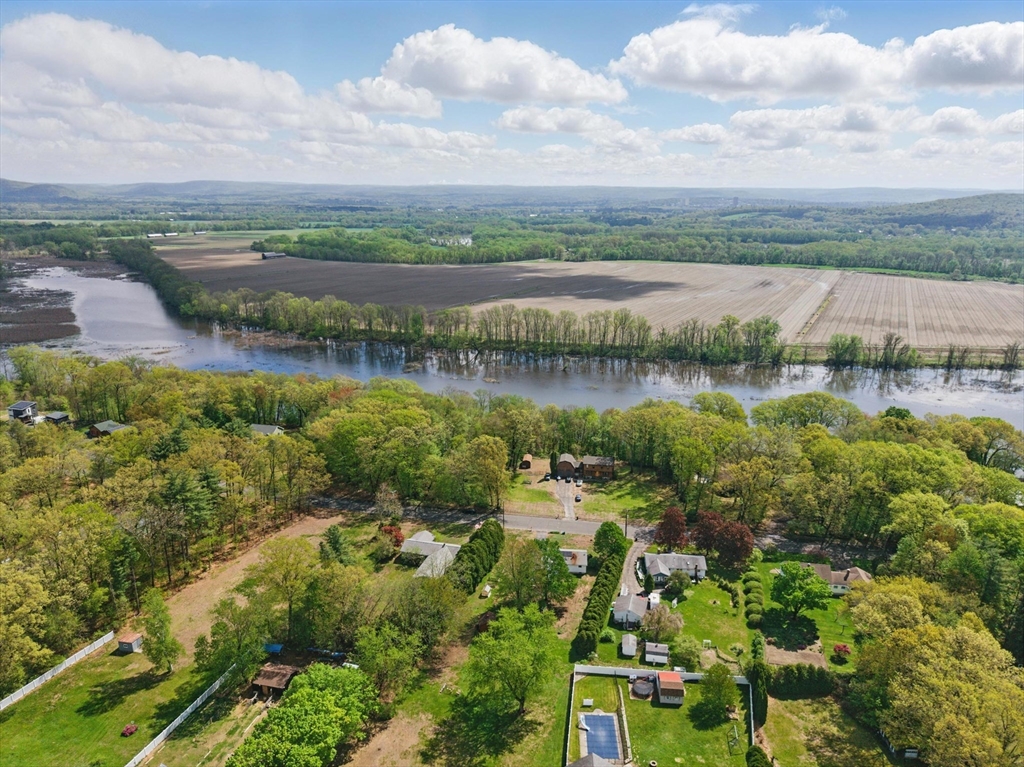 19 Straits Road Hatfield, MA 01038 - Photo 39 of 42 a view of a lake with houses in the back