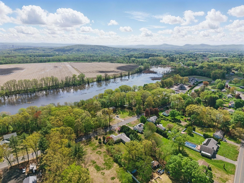 19 Straits Road Hatfield, MA 01038 - Photo 40 of 42 a view of a lake with houses in back